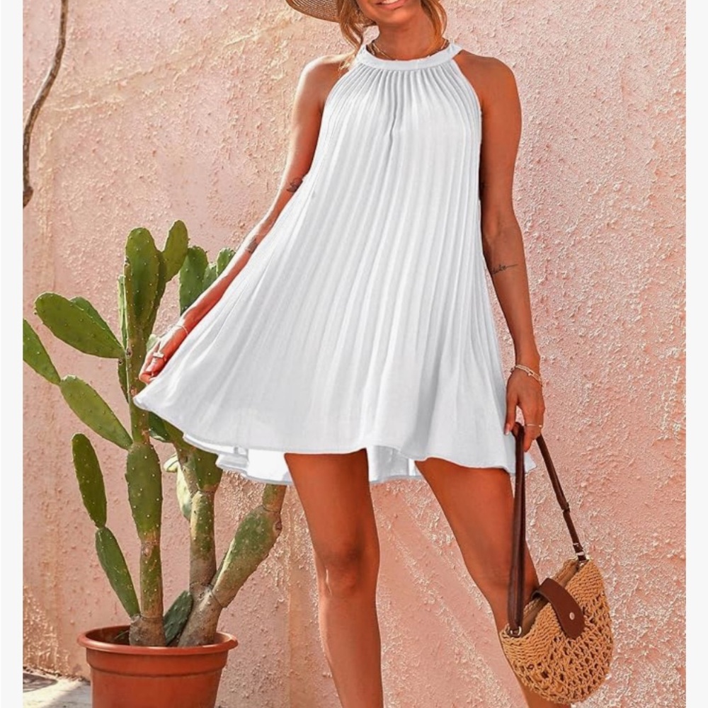 Women’s white flowy summer dress.
Size Large